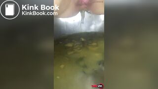 Naughty girl has diarrhea in sink