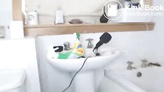 Wild girl puts herself an enema in the bathroom