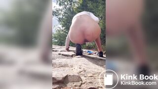 Girl outdoor pooping