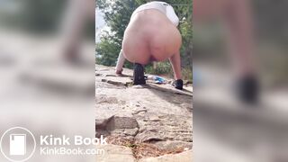 Girl outdoor pooping