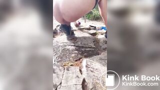 Girl outdoor pooping