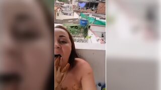 Solo scat play Latina on a balcony in a slum..