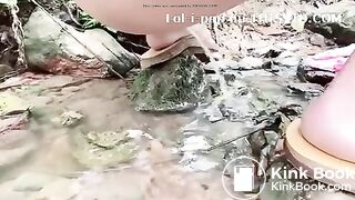 Asian Beauty - pooping in the river