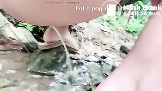 Asian Beauty - pooping in the river