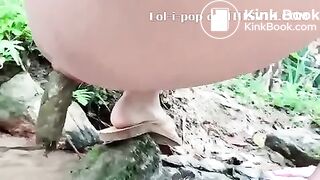 Asian Beauty - pooping in the river