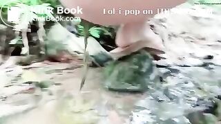 Asian Beauty - pooping in the river