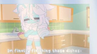 Cyan is washing dishes as she soils her diaper