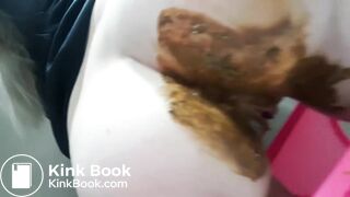 Pink panties overflowing with soft poop