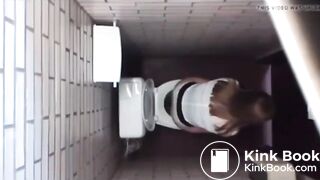 Two women pooping