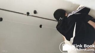 Asian restroom under stall spy