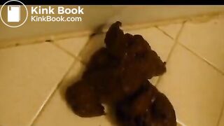 Cute girl poops near the bathtub..