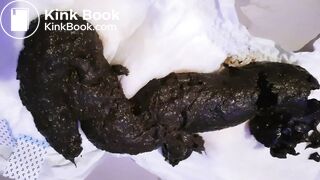 Big poo on open diaper..