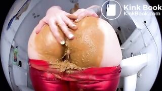 Betty in shitting in Red leather pants