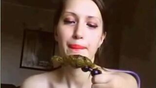 Eating her scat off anal beads