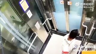 Asian woman shitting in an elevator
