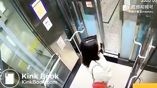 Asian woman shitting in an elevator