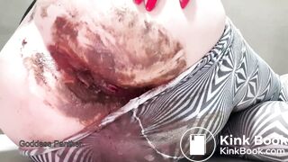 Big poop in black and white pantyhose