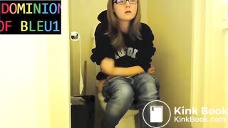 Sexy girl pushing on toilet