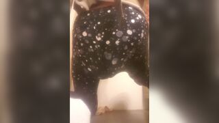Woman shits her sparkly leggings