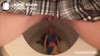 cute blonde schoolgirl shitting on a doll