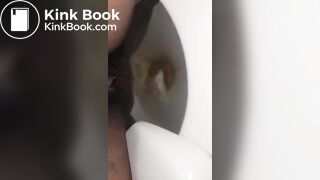 She Poops while on the Toilet