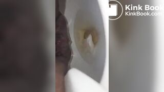 She Poops while on the Toilet