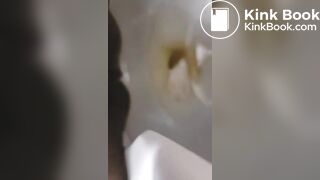 She Poops while on the Toilet