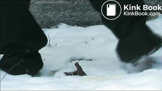 Relieving herself in the snow..