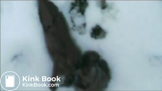 Relieving herself in the snow..