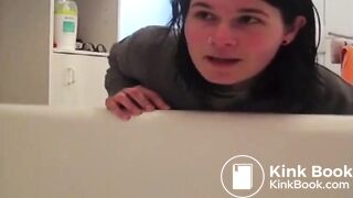 Girl shits in a tub