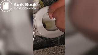 Girl pooping and peeing on toilet