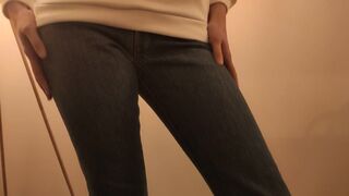 Girl messes her jeans and rubs