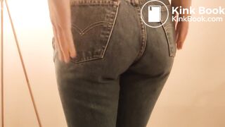 Girl messes her jeans and rubs