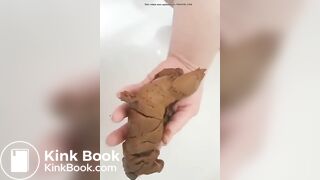 Woman poops in the palm of her hand