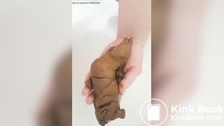 Woman poops in the palm of her hand