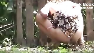 Cute Russian woman outdoor spy poop 148