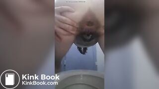 Women takes a shit then smears her poo on her