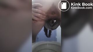 Women takes a shit then smears her poo on her
