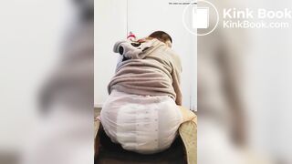 Girl bounces In her messy diaper