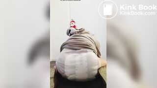 Girl bounces In her messy diaper