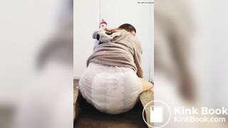 Girl bounces In her messy diaper