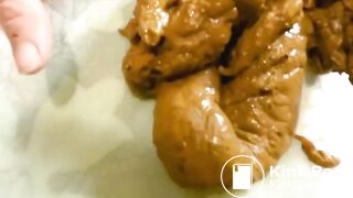 Tattoo women takes a smelly shit