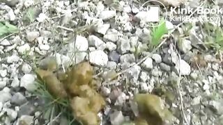 An Asian lady poops in the bushes..