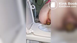 Push out big turd in toilet