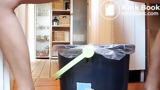 German lady defecates in a trash can..