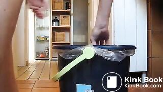 German lady defecates in a trash can..