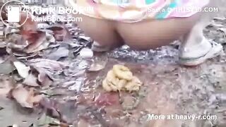 Desi aunty shitting in the open