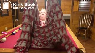 Changing her messy diaper on the pool table