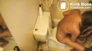 Tanned hot blonde girl shitting a lot on toilet