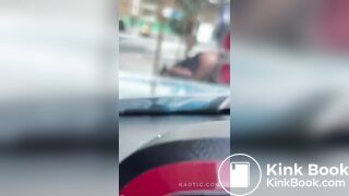 Woman shits on the street.